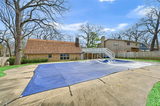 view of swimming pool with a patio