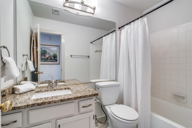 full bathroom with toilet, vanity, and shower / tub combo with curtain