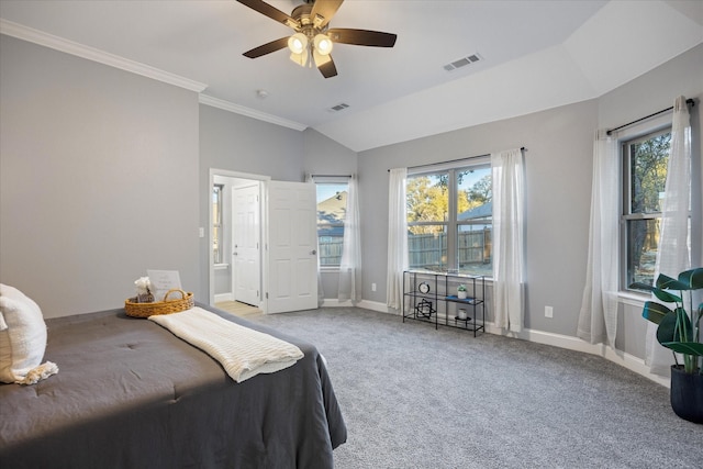 bedroom with ceiling fan, connected bathroom, ornamental molding, and light carpet