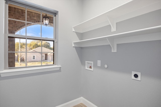 laundry room with hookup for a washing machine, hookup for an electric dryer, and hookup for a gas dryer