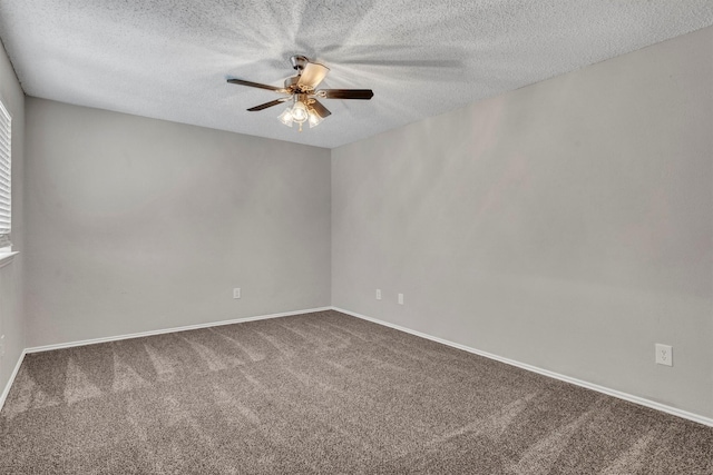 empty room with a textured ceiling, ceiling fan, and carpet flooring