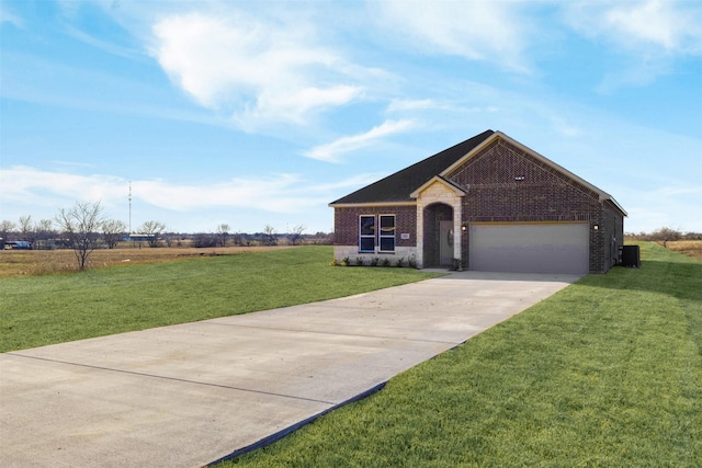 ranch-style home with a front yard and a garage