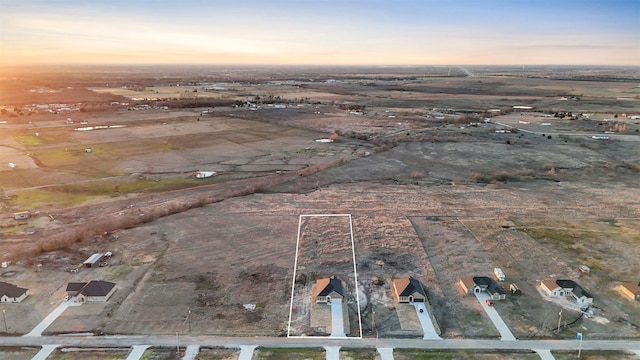 view of aerial view at dusk