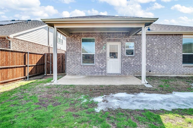 rear view of house with a patio