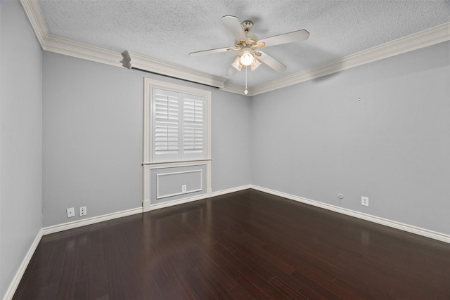 empty room featuring dark wood-type flooring, ceiling fan, a textured ceiling, and crown molding