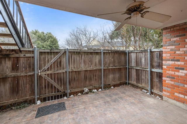 view of patio / terrace featuring ceiling fan