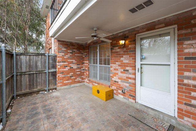 view of patio / terrace featuring ceiling fan