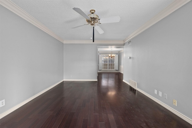 unfurnished living room with ceiling fan with notable chandelier, dark wood-type flooring, a textured ceiling, and crown molding