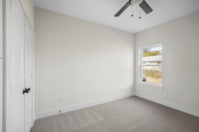 unfurnished bedroom featuring ceiling fan and carpet flooring