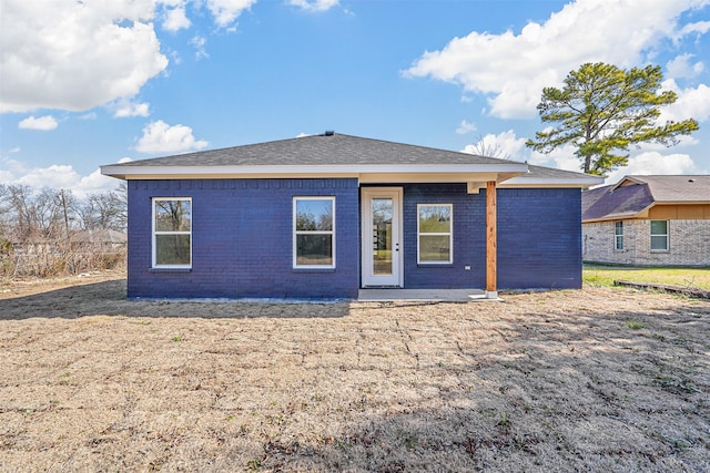 back of property featuring a patio area