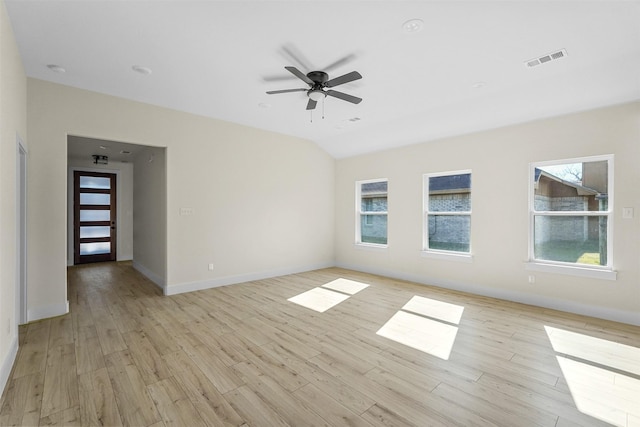 unfurnished room featuring ceiling fan, a healthy amount of sunlight, and light hardwood / wood-style flooring