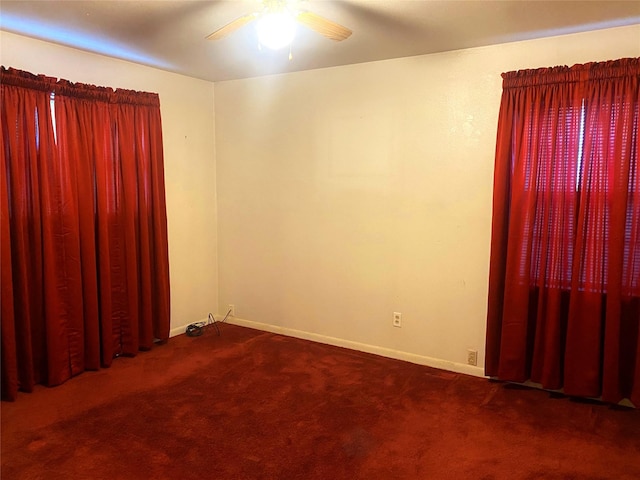 carpeted empty room with ceiling fan