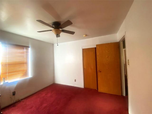 interior space featuring ceiling fan