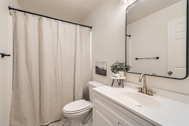 bathroom with a shower with curtain, vanity, toilet, and tile patterned flooring