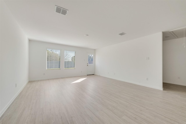 empty room with light wood-type flooring