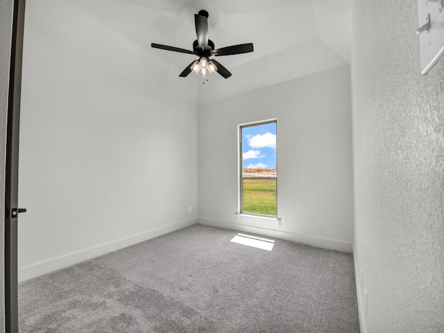 empty room with carpet floors and ceiling fan