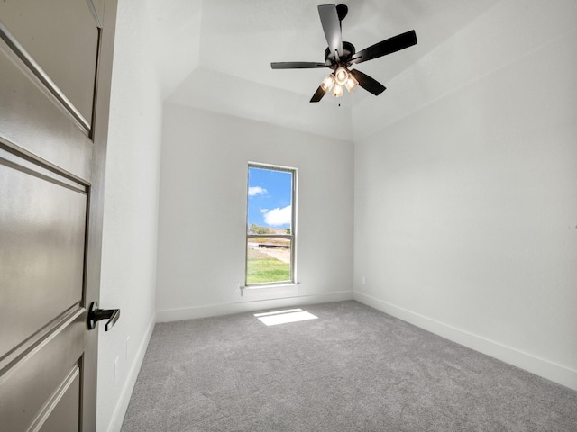 unfurnished room with ceiling fan, carpet, and lofted ceiling