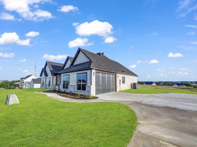 view of property exterior featuring a garage and a lawn