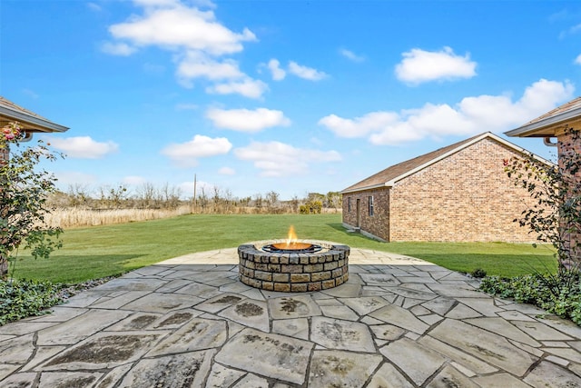 view of patio / terrace featuring a fire pit