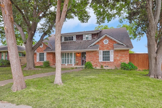 view of front of home with a front lawn