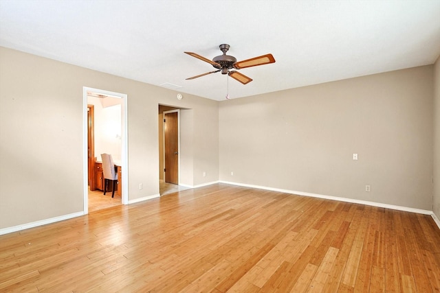 spare room with ceiling fan and light hardwood / wood-style flooring