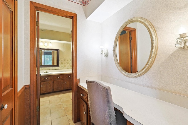 bathroom with vanity and tile patterned flooring