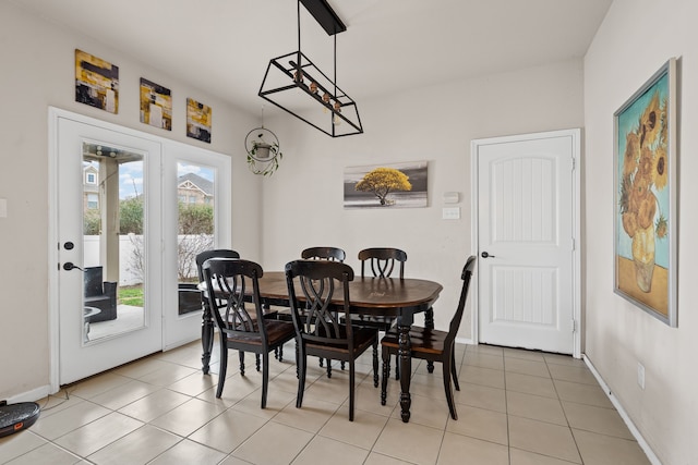 dining room featuring light tile patterned flooring