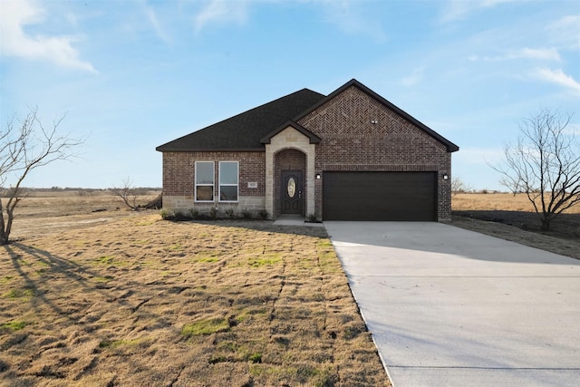 view of front of property featuring a garage