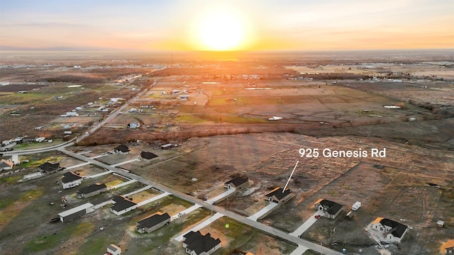 view of aerial view at dusk