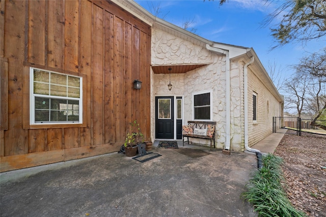 doorway to property featuring a patio