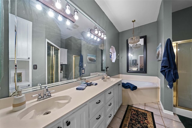 bathroom featuring vaulted ceiling, tile patterned floors, vanity, and plus walk in shower