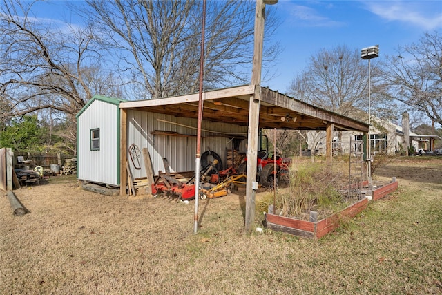 view of outbuilding with a lawn