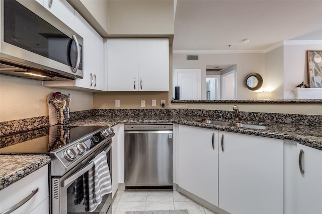 kitchen featuring white cabinets and stainless steel appliances