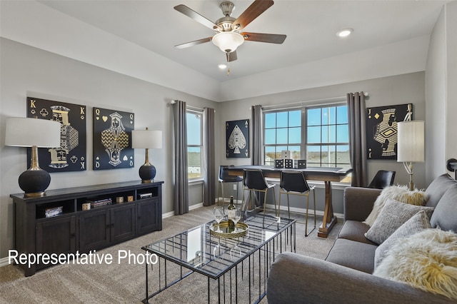 living room featuring ceiling fan and light carpet