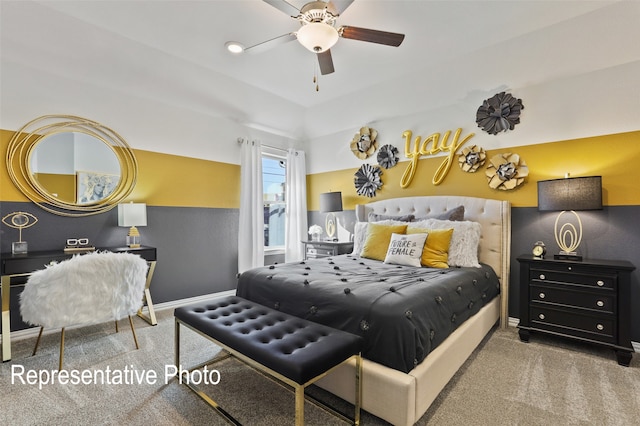 bedroom with ceiling fan and light colored carpet