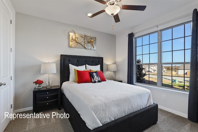 carpeted bedroom with ceiling fan