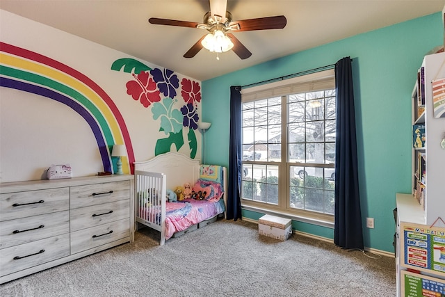 bedroom with ceiling fan and carpet flooring