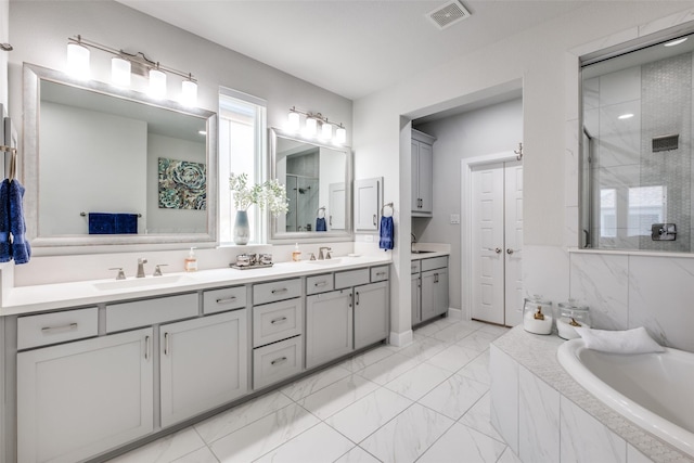 bathroom with vanity and plus walk in shower