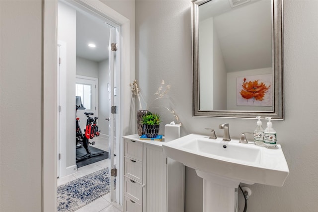 bathroom featuring sink and tile patterned flooring