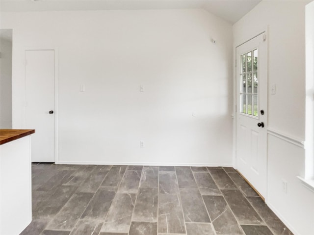 entryway with vaulted ceiling