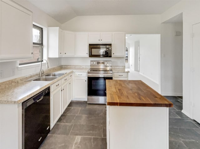 kitchen with sink, white cabinetry, black appliances, and wood counters