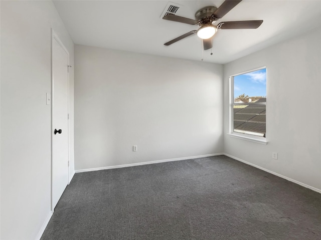 carpeted empty room with ceiling fan