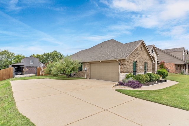 view of home's exterior featuring a garage and a lawn