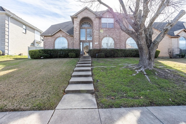 view of front of home with a front yard