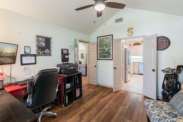 office space featuring ceiling fan, dark hardwood / wood-style floors, and high vaulted ceiling