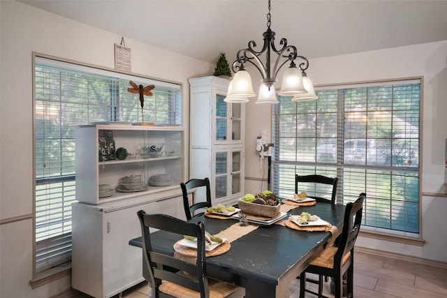 dining area with a notable chandelier