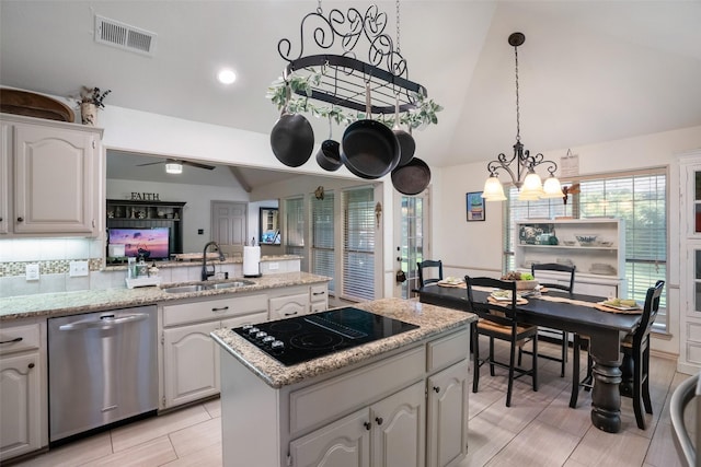 kitchen with white cabinetry, black electric stovetop, dishwasher, vaulted ceiling, and sink