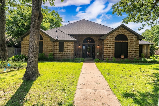 view of front of property with a front lawn