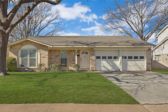 single story home with a front yard and a garage