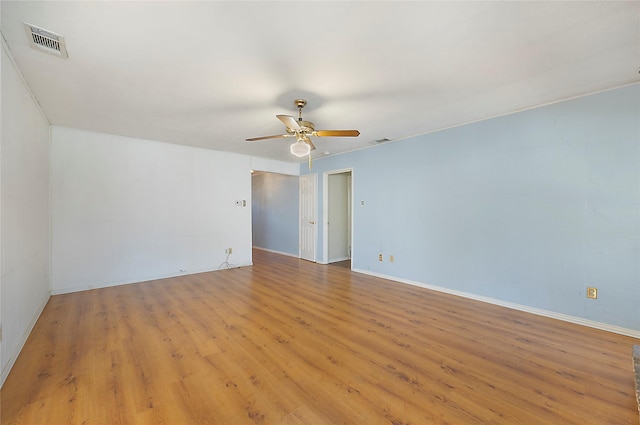 unfurnished room featuring ceiling fan and light hardwood / wood-style floors